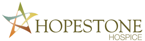 Hopestone Hospice logo set in a serif all caps font featuring an outlined star with a different subdued color for each point